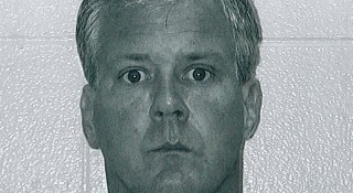 Chicago Police Lt. Denis P. Walsh, booking photo from Kalamazoo Township Police